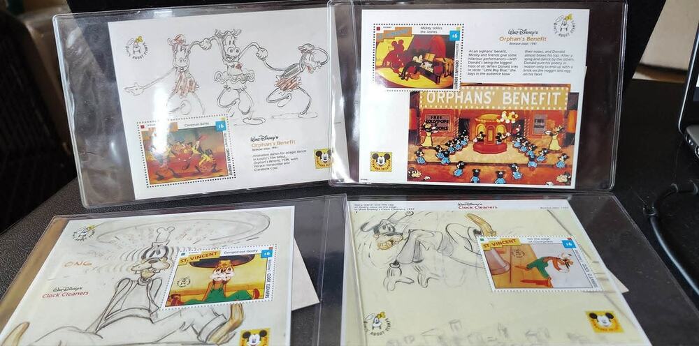 4 MNH ICS sheets, 2 Orphans Benefit, 2 Clock Cleaners, Mickey Goofy